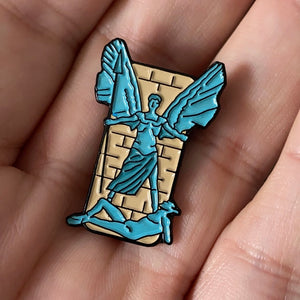 St Michael and the Devil pin badge